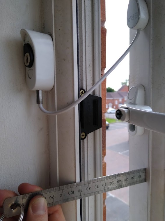 Window restrictor with gap to British Standard