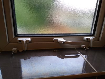 Sash stoppers on window