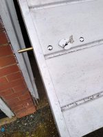 Key operated concealed security bolt on garage door