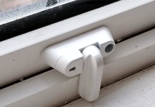 Sash jammer on window